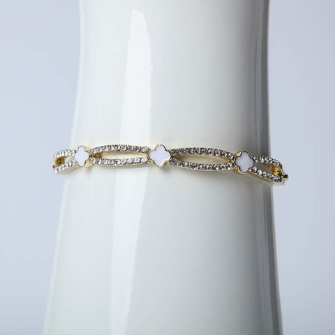 Golden bangle with crystal stones for women's accessories by Bentati Fashion Dubai