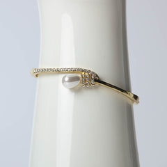 Golden bangle with pearl and crystal stone for women's accessories by Bentati Fashion Dubai