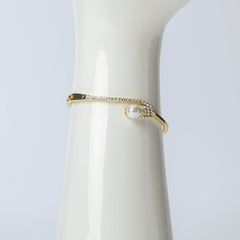 Golden bangle with pearl and crystal stone for women's accessories by Bentati Fashion Dubai