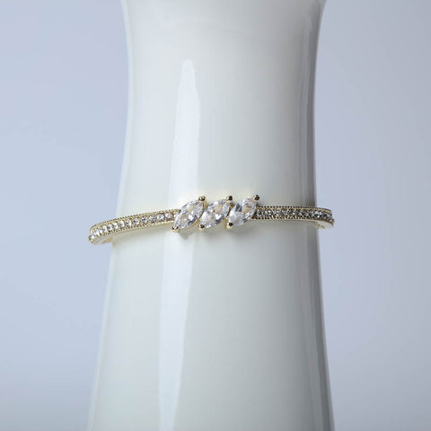 Elegant golden bangle for women's accessories by Bentati Fashion Dubai