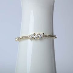 Elegant golden bangle for women's accessories by Bentati Fashion Dubai