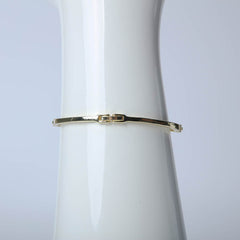 Elegant golden bangle for women's accessories by Bentati Fashion Dubai