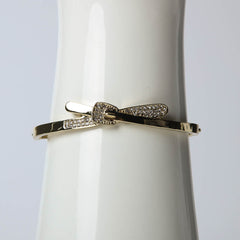 Golden belt bangle for women's accessories by Bentati Fashion Dubai