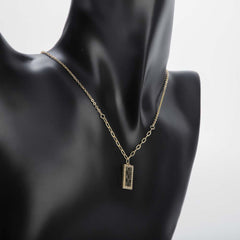 Golden rectangular pendant necklace with crystal stones for women's accessories by Bentati Fashion Dubai