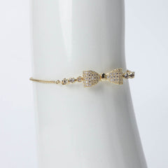 Golden ribbon bracelet with crystal stones for women's accessories by Bentati Fashion Dubai