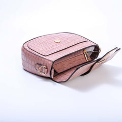 Pink crossbody bag with detachable strap and tassel for women by Bentati Fashion Dubai