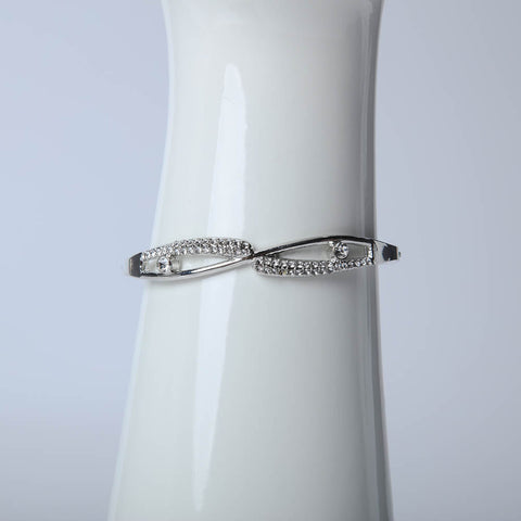 Silver infinity bangle with crystal stones for women's accessories by Bentati Fashion Dubai