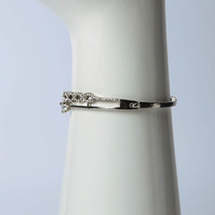 Silver infinity bangle with crystal stones for women's accessories by Bentati Fashion Dubai