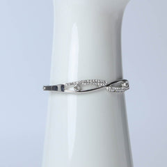 Silver infinity bangle with crystal stones for women's accessories by Bentati Fashion Dubai